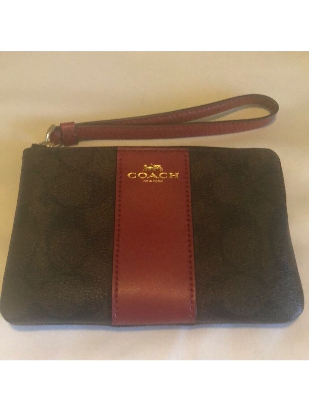 Coach Corner Zip Wristlet In Signature Canvas (Red/Brown)
